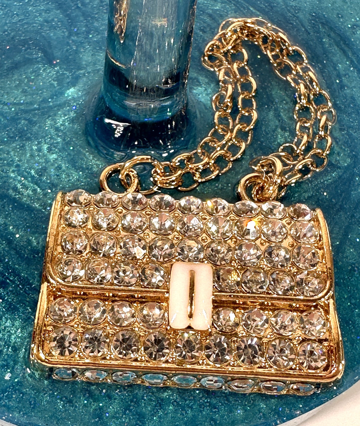 0089 Wine glass with gold rhinestone handbag on teal